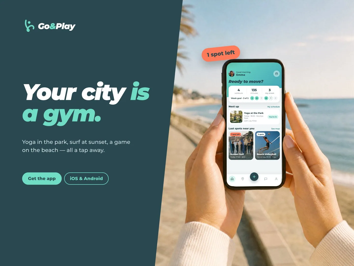 Hands holding a phone with the Go&Play home screen on the beach promenade