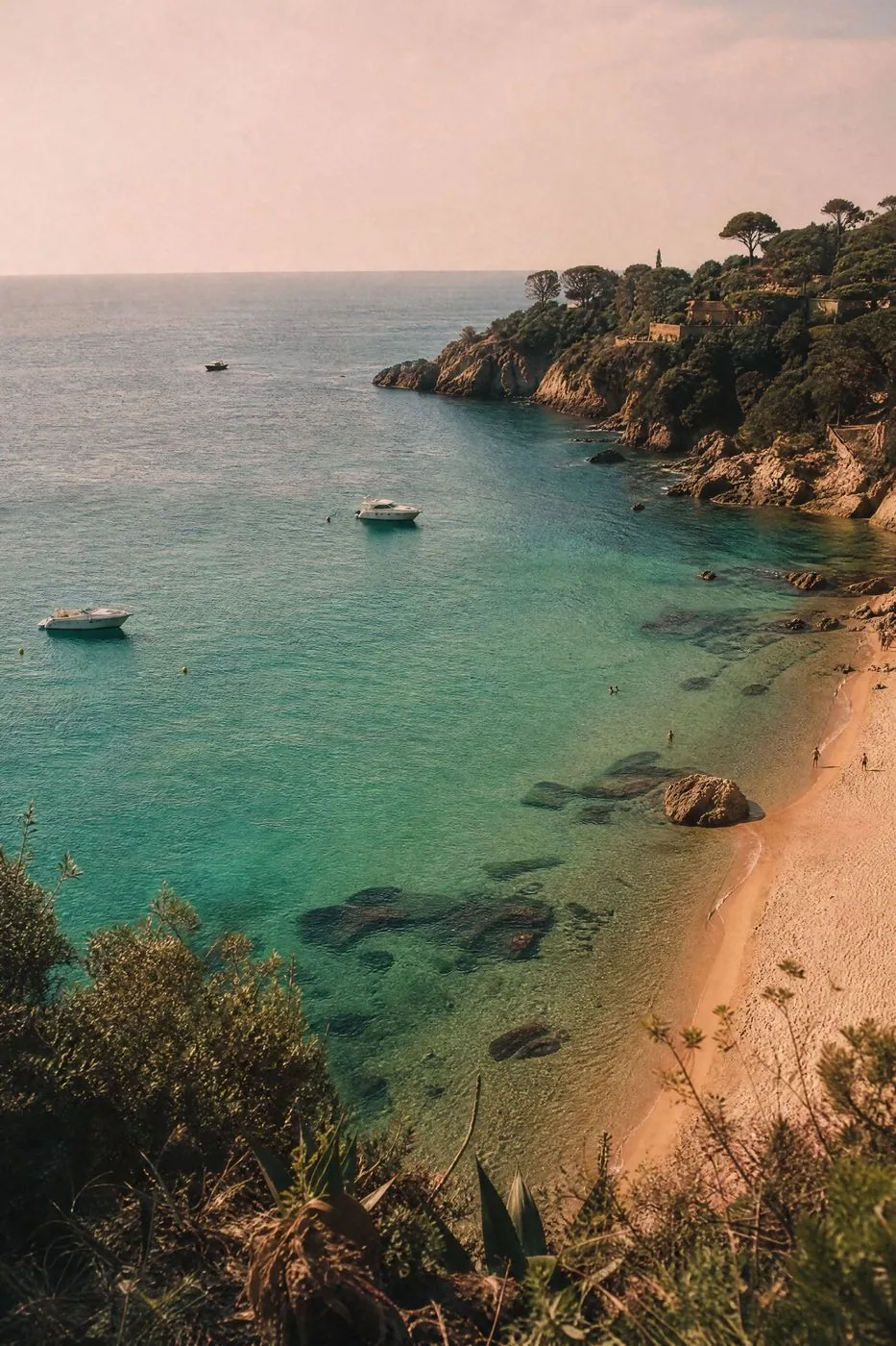 Mediterranean bay with turquoise water and a sandy beach
